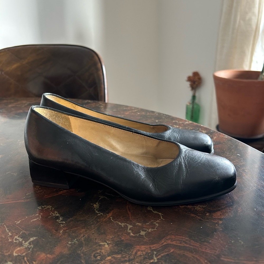 Black leather heeled flats